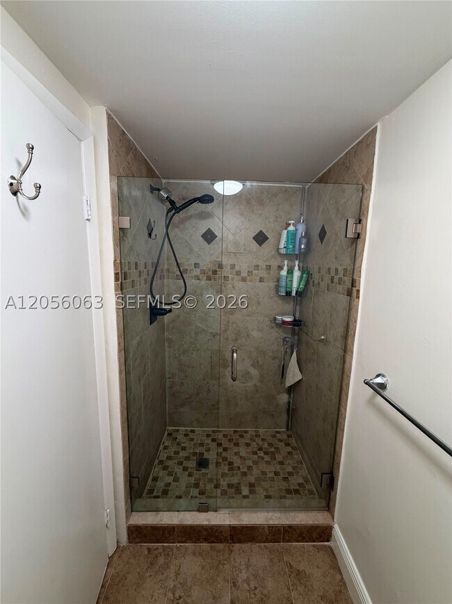 Building Photo - 10875 SW 112th St Unit 303