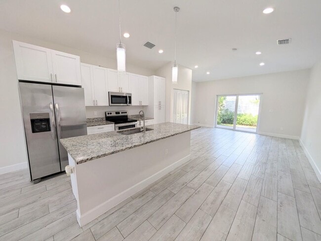 Photo - 1566 W 26th Ct Apartamento