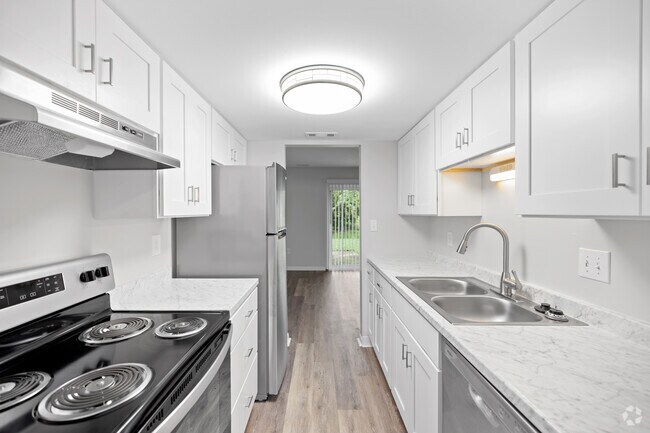 3BR, 2.5BA - 1,250SF - Kitchen - Wingate at Belle Meadows Apartments