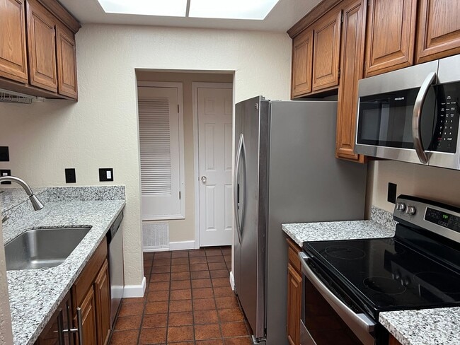 Photo - GATED COMMUNITY WITH POOL & HOT TUB NESTLE...