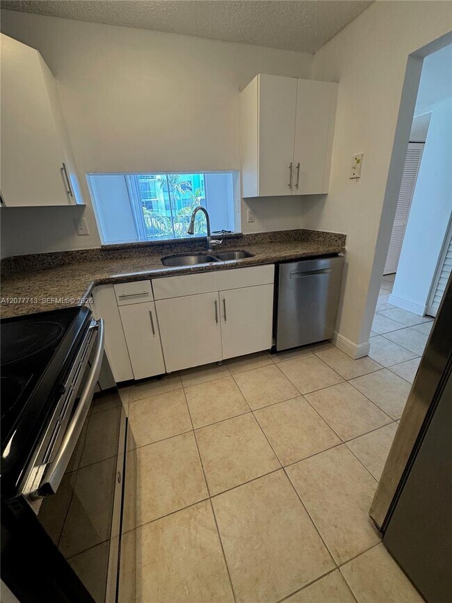 Photo - 488 NW 165th St Unit B-412