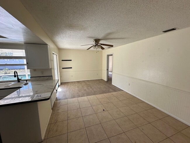 Photo - Spacious 4-Bed Pool Home in Gulf Gate East - Available Now!