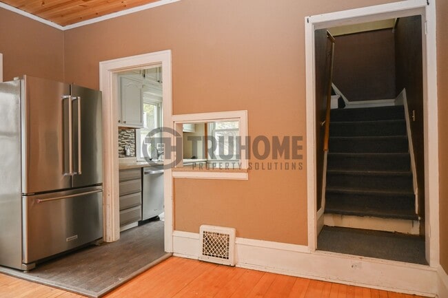 Photo - Large 3 Bedroom 2 Bath House w/Fenced in Yard and 2 Stall Garage Available Soon!