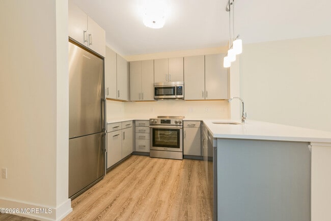 Building Photo - 700 Bangs Ave Unit 205