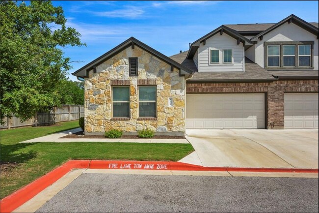 Corner lot with garage and open front yard - 2304 S Lakeline Blvd Unit 461