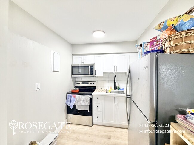 Photo - Bright & Spacious 2-Bedroom Apartment with... Unit 12