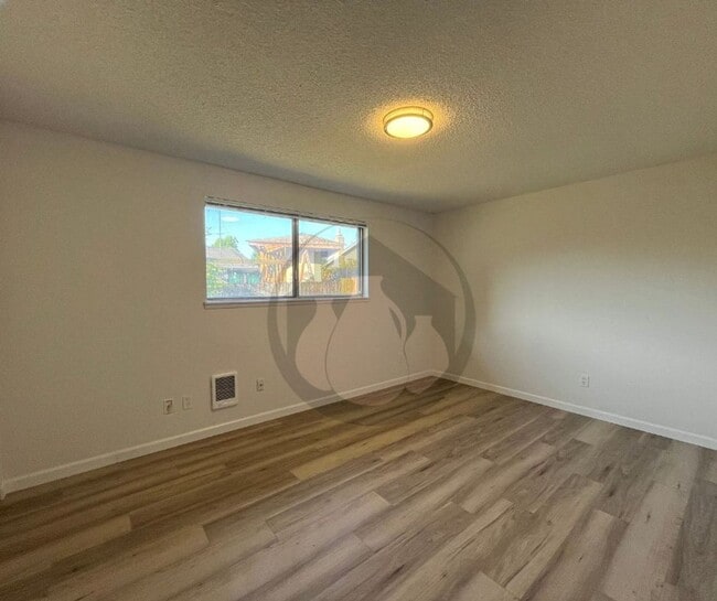 Photo - Single Level Triplex Ready to move In!