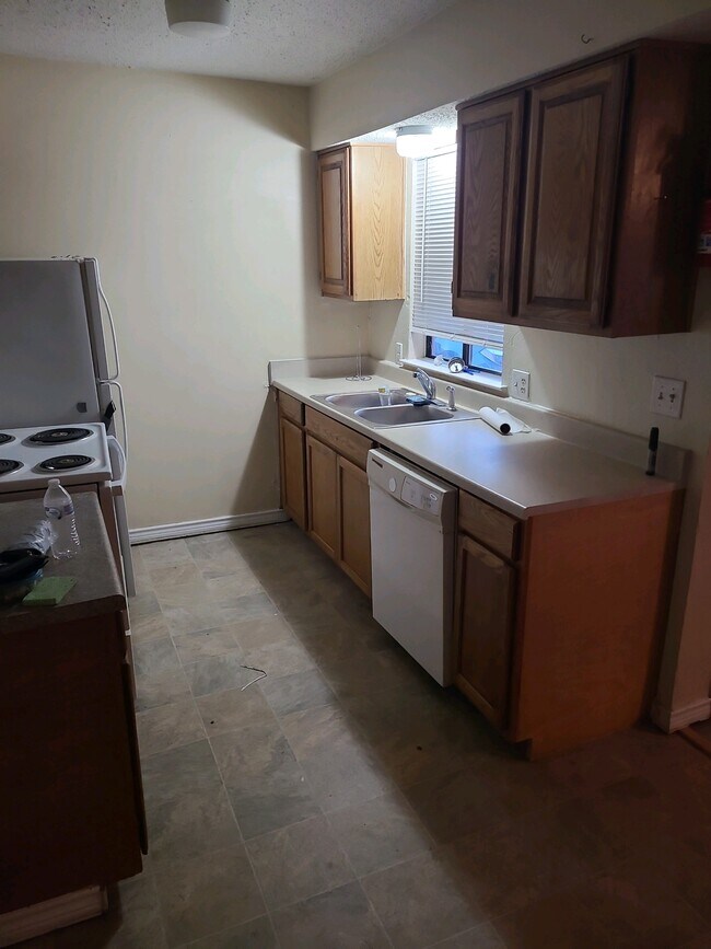 Sample photo of kitchen - actual cabinets painted - 201 W Trinity St Unit B