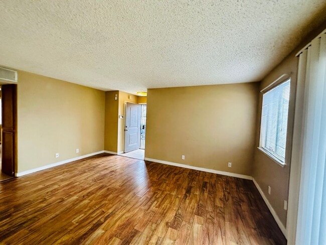 Photo - Downstairs Corner 2-Bedroom Condo in Centr...