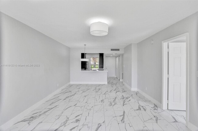 Building Photo - 11453 NW 39th Ct Unit 309-2 Rental