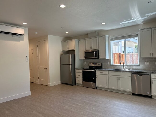 Photo - Coming soon! 2 bed 1 bath townhome with attached garage