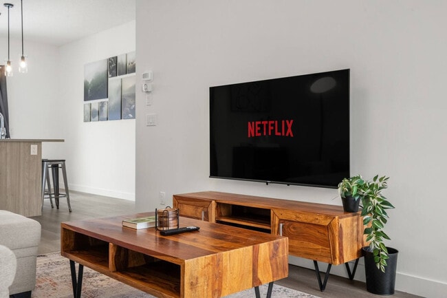 Photo - 2231-2281 81 St S W Unité SI ID1511975P