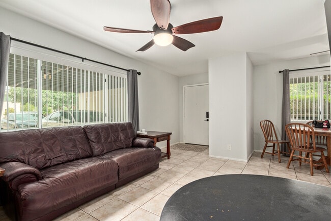 Living room with front door entrance - 115 W 10th St Unit 10th and Ash condo 115