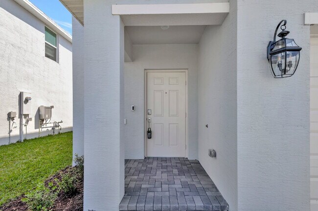 Photo - Luxurious Living: Spacious 5-Bedroom Home with Scenic Views in Port Saint Lucie!
