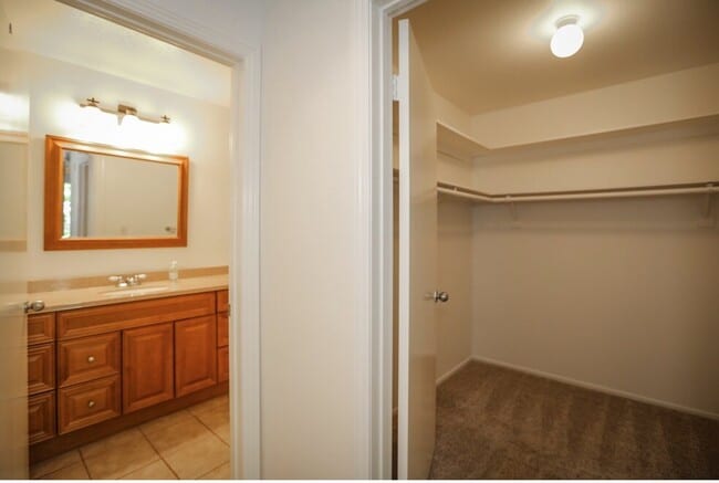 Walk in Closet and Master Bath - The Westwood Bentley Apartments Unit 303