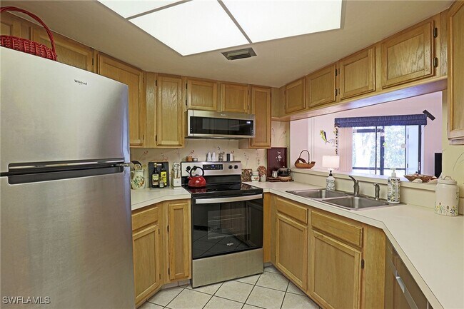 Photo - 9627 Eaton Gardens Ln Unit 104