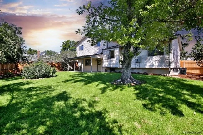Covered patio and fenced-in back yard