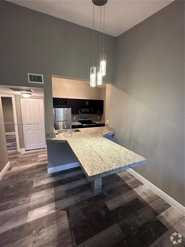 Building Photo - 2890 N Oakland Forest Dr Unit 201 Rental