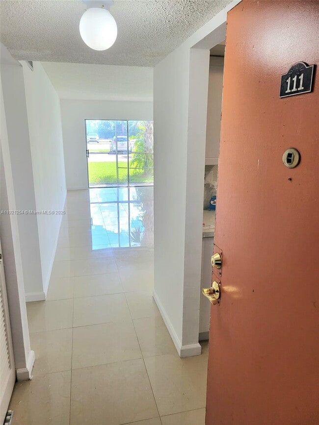 Building Photo - 3600 NW 21st St Unit 111