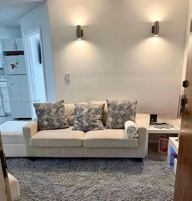 Building Photo - 5055 NW 7th St Unit 405