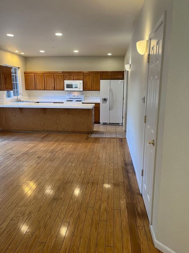 Photo - 3 bedroom 2.5 bath town home with large bonus living room and 2 car garage parking