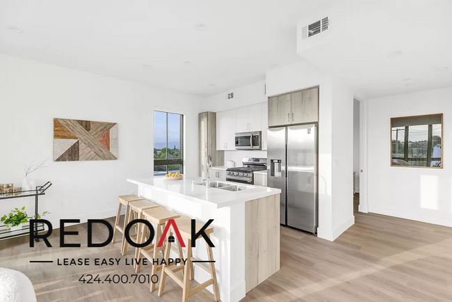 Building Photo - 12444 Chandler Blvd Unit 318 Rental