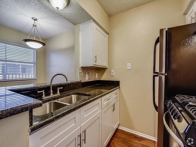 Building Photo - 2401 Manor Rd Unit 119 Rental