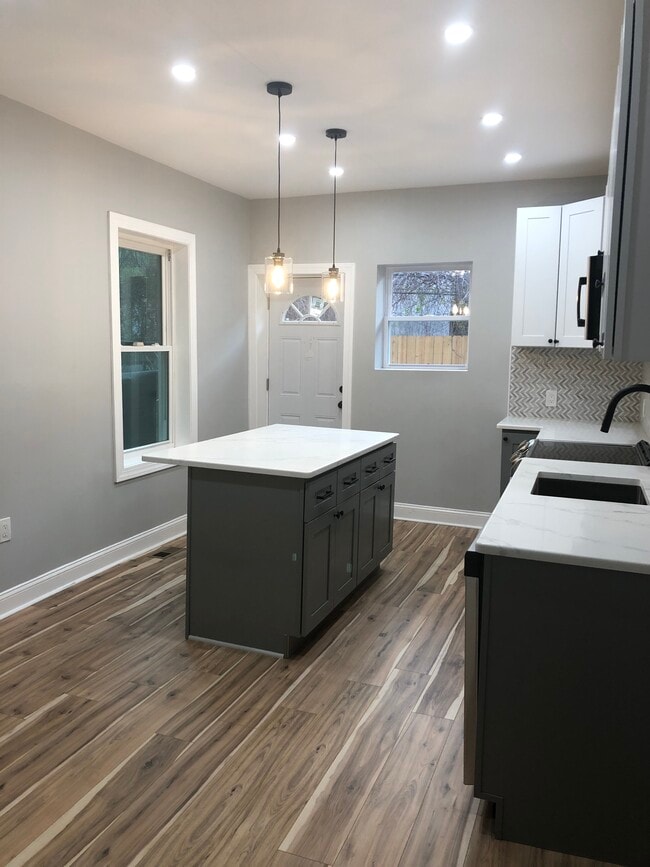 Kitchen with Island - 1848 N 23rd St Unit 1