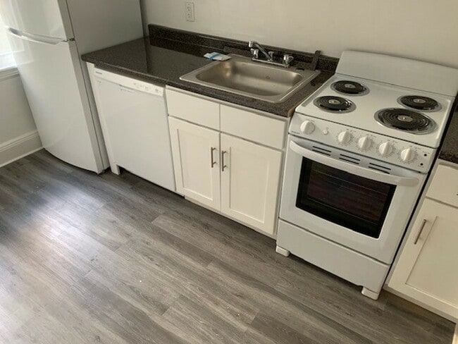 Building Photo - No Brokers fee, No Security Deposit, heat, Hot Water Included, Elevator, Laundry. Steps from the T