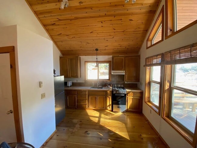 Photo - Move-In Ready 2-Bedroom Cabin-Style Home with Deck, Knotty Pine & HOA Included in Pine Mountain Club