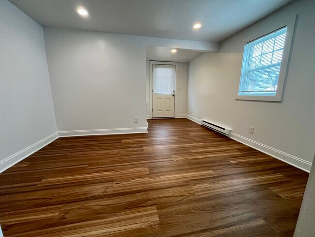 Front entry and living room - 14 Center Ave Unit 1N