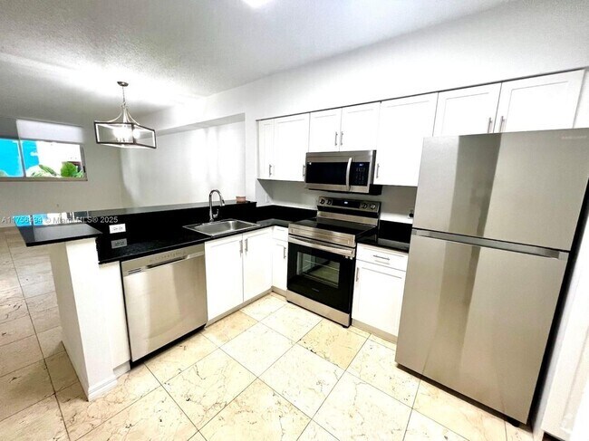 Building Photo - 5091 NW 7th St Rental