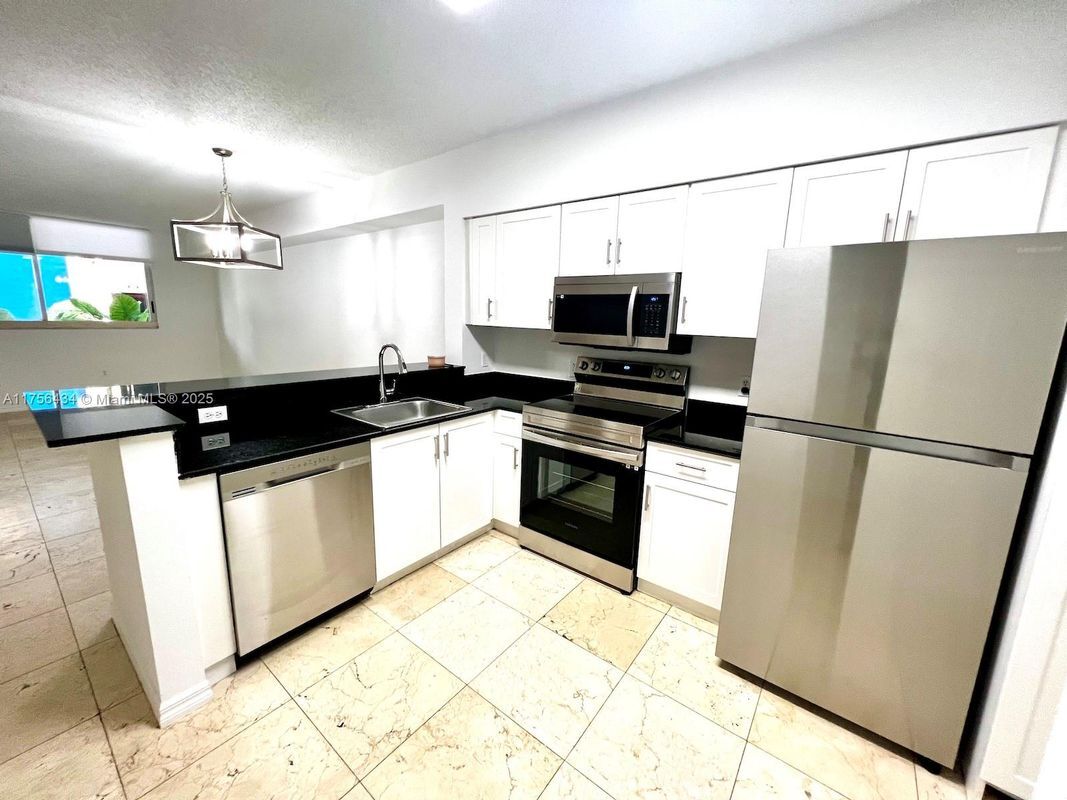 Photo - 5091 NW 7th St Condo