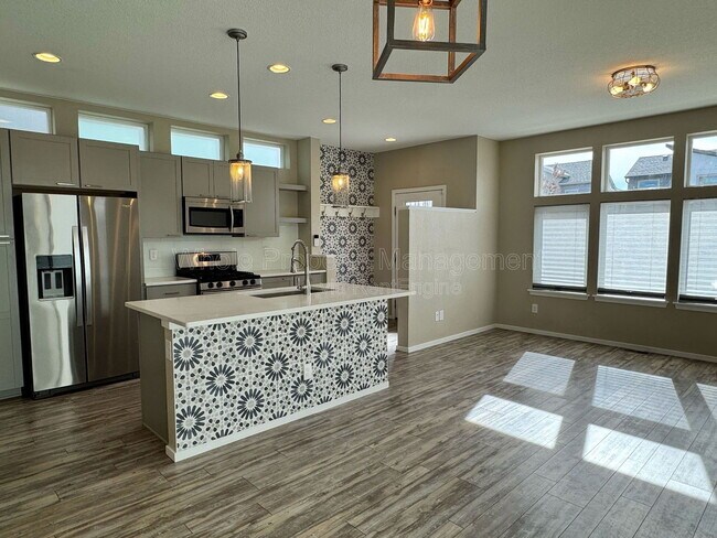 Photo - 1451 W 67th Ave