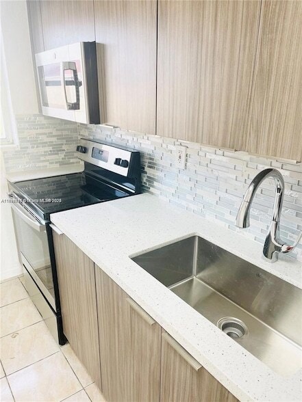 Photo - 605 W 68th St Unit 23