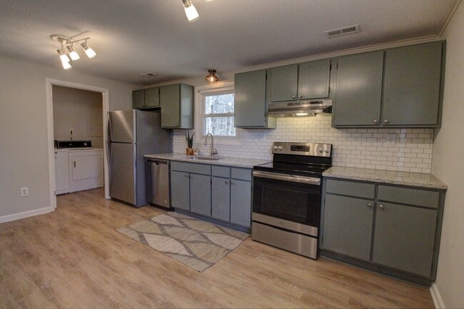 Photo - Available late August! Adorable + updated 3 bedroom home with fenced yard, 10 minutes from Downto...