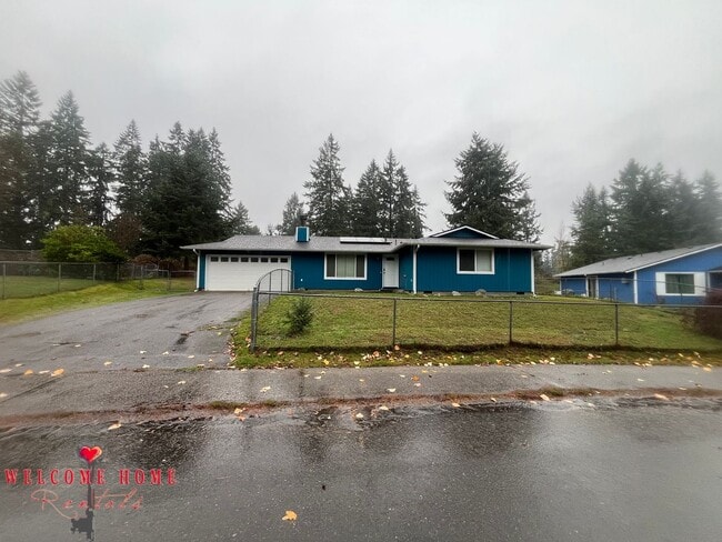 Photo - Remodeled rambler, no carpet, with HUGE fenced yard!!