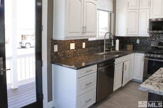Photo - Custom built in 2021; 3-bedroom 2.5-baths; 2-car garage plus 2 off-street spaces
