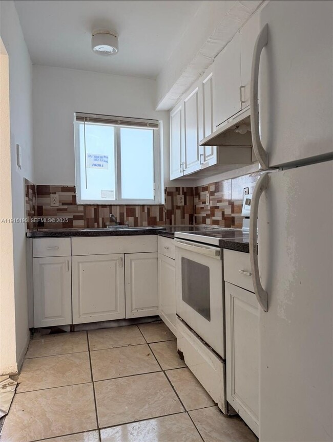 Building Photo - 8447 NW 4th Ave Unit 8447