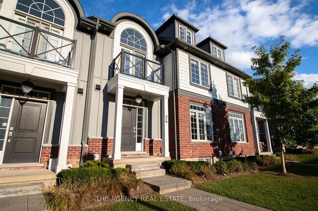 Building Photo - BEAUTIFUL TOWNHOME  *SUNNINGDALE * 5 Bedroom * Garage * AVAIL NOW Unit 24