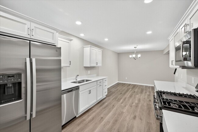 Photo - New construction interior-unit townhome in...