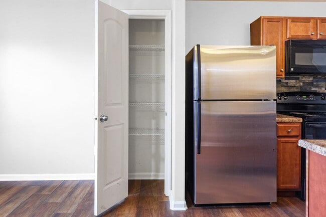 Photo - pdated 2BR/2.5BA Townhome with Private Fenced Patio