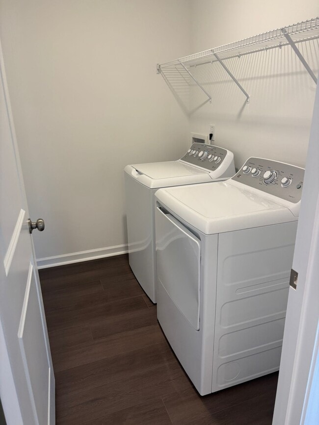 Laundry area with washer and Dryer - 142 Beachcomber Dr