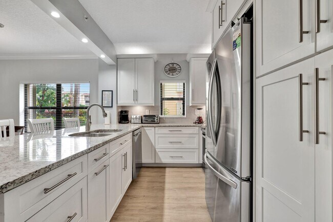 400 Uno Lago Dr Condo Unit 105 - Image 