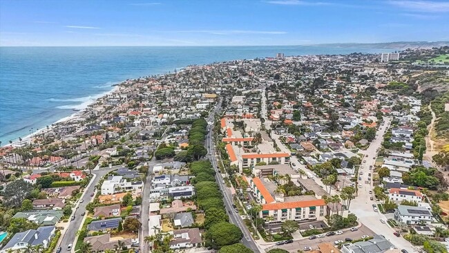 Photo - JUST BLOCKS TO THE BEAUTIFUL WIND AND SEA BEACHES!