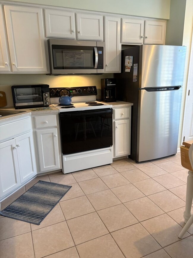 Photo - 3 BR, 2.5 BA Versailles Townhouse - Pet Friendly, Bike to Beach