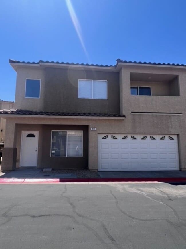 Building Photo - Three bedroom townhouse with 2 car garage