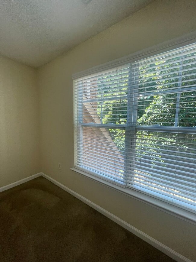 Building Photo - 3930 Cherokee Woods Way Unit 10-201 - D