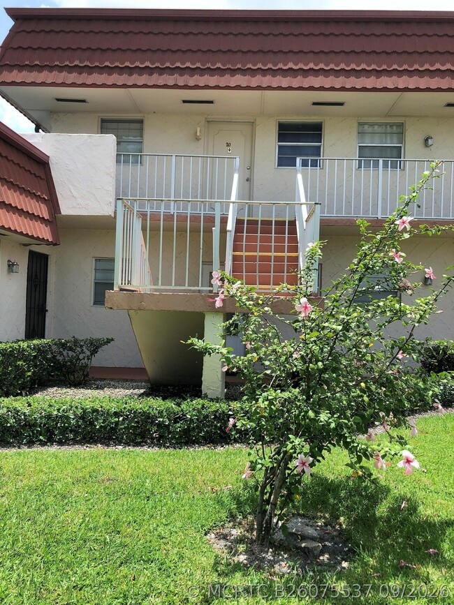 Building Photo - 12011 Poinciana Blvd Unit 202