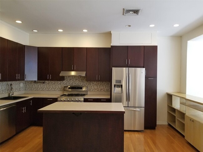 Photo - 232 E 53rd St Townhome
